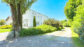 Nordseite - Zufahrt zum Carport und zum Garten