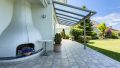 Terrasse mit offenem Kamin